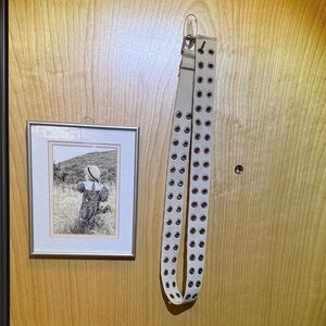 Flawless condition double hole row beige adjustable belt. 100% cotton. Size Med.